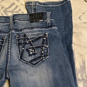 A209.   Petrol Sayward  Blue Boot Cut Jeans with Embellished Pockets